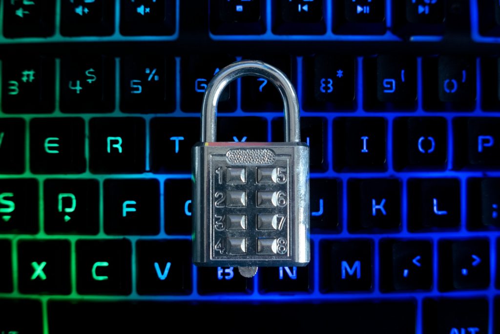 Top view of padlock on a computer keyboard.lock, hacker, internet, keyboard, safety, information, cy